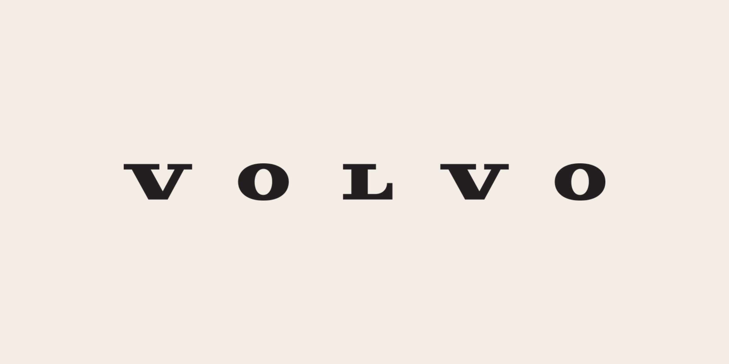 The Volvo cars logo on a cream background